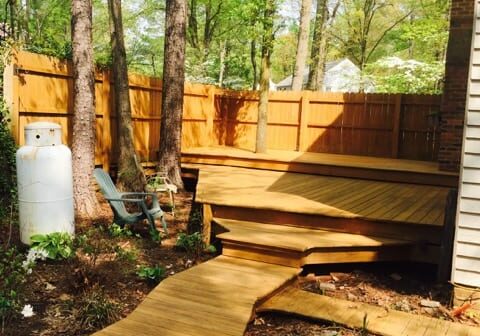 Residential patio after Reyco wood cleaning and sealing.