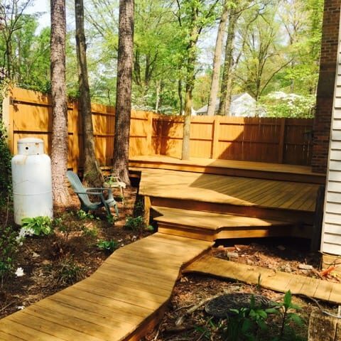 Residential patio after Reyco wood cleaning and sealing.